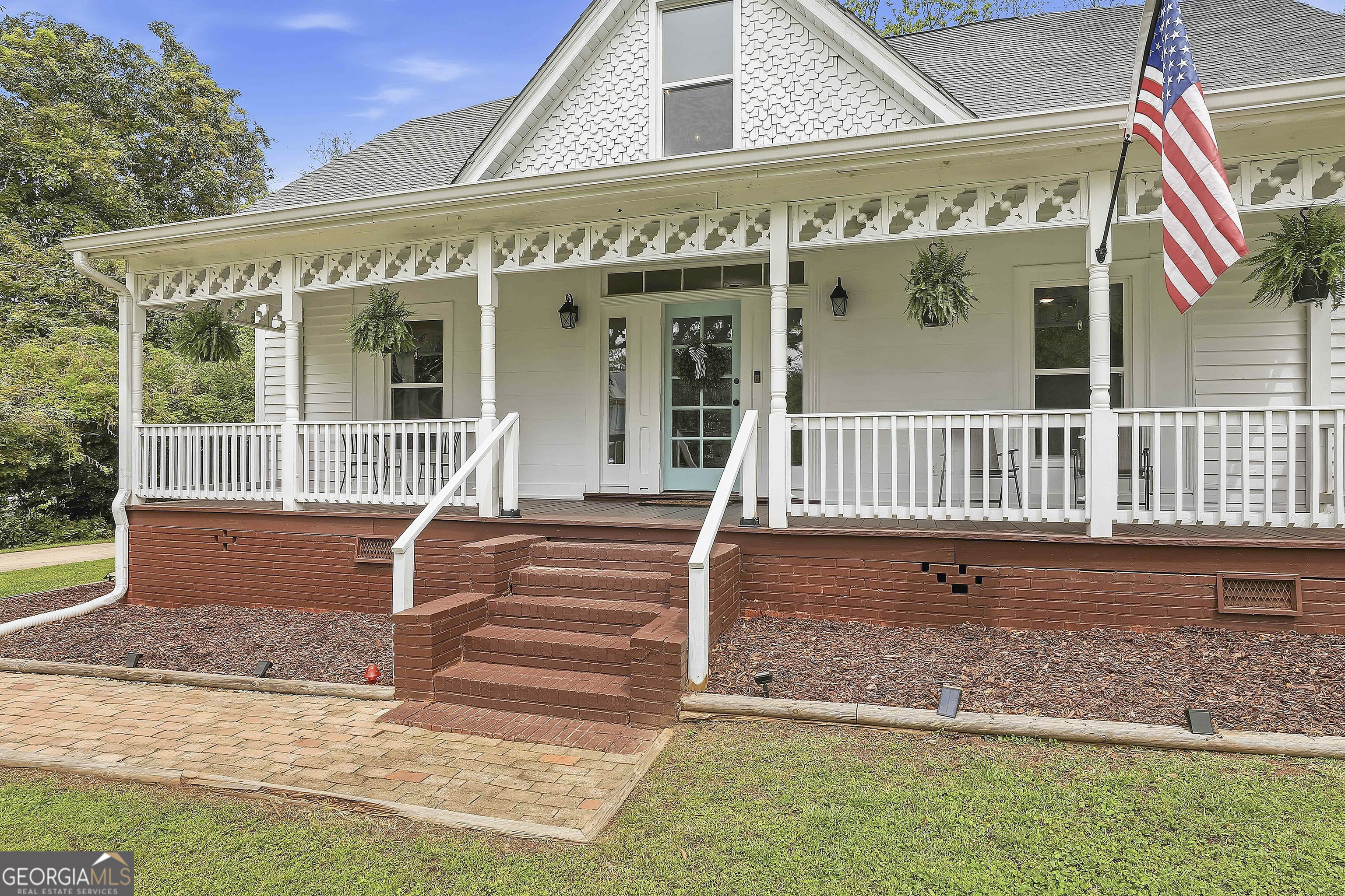 21 Smith Street Grantville, GA 30220 - Photo 10 of 72 a view of a house with a small yard and wooden floor and fence
