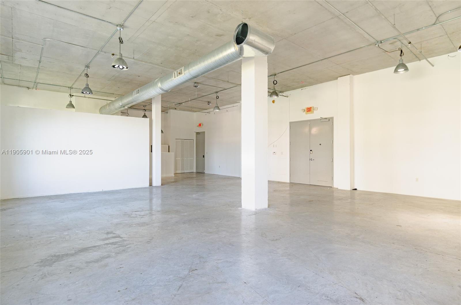 250 Northwest 23rd Street, Unit 202 Miami, FL 33127 - Photo 2 of 8 a view of a big room
