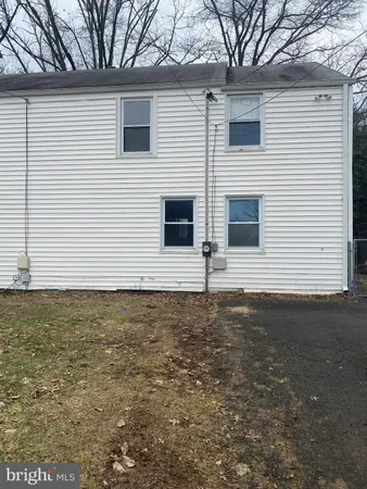 a view of an house with backyard space