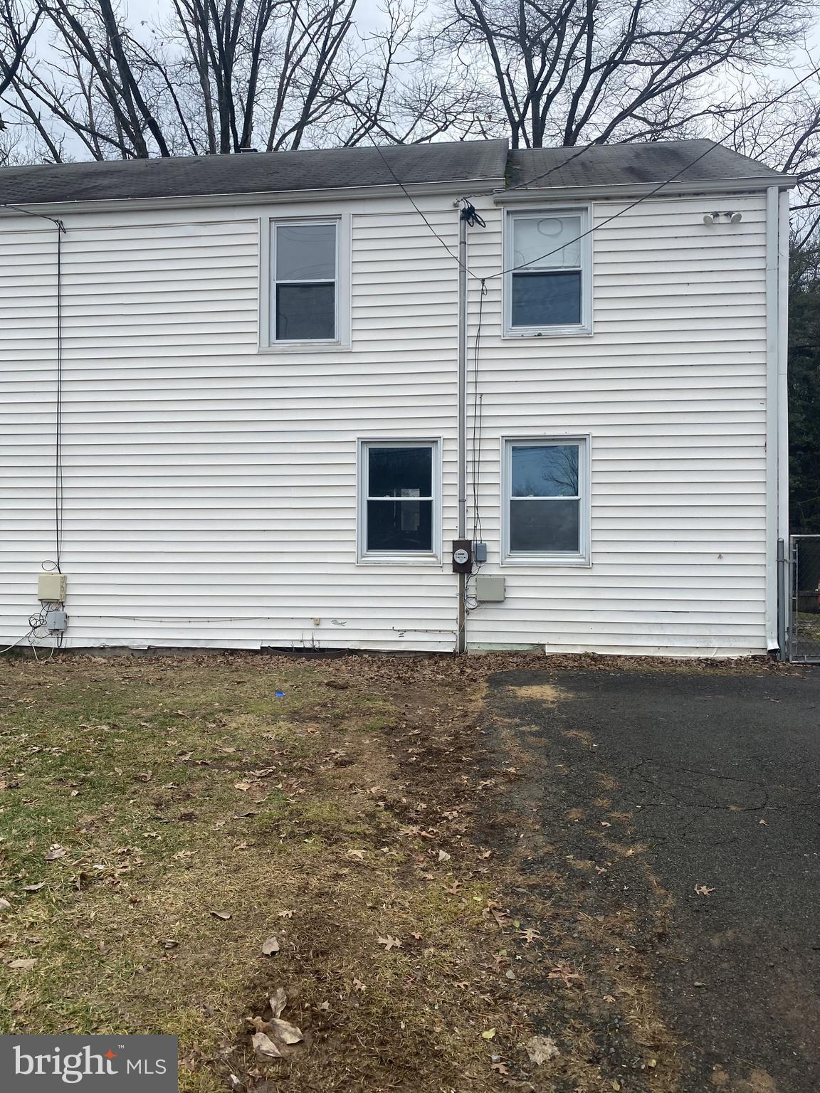 a view of an house with backyard space