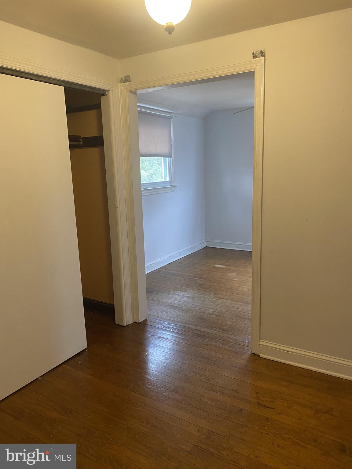459 Scotch Road Titusville, NJ 08560 - Photo 11 of 16 an empty room with wooden floor and closet