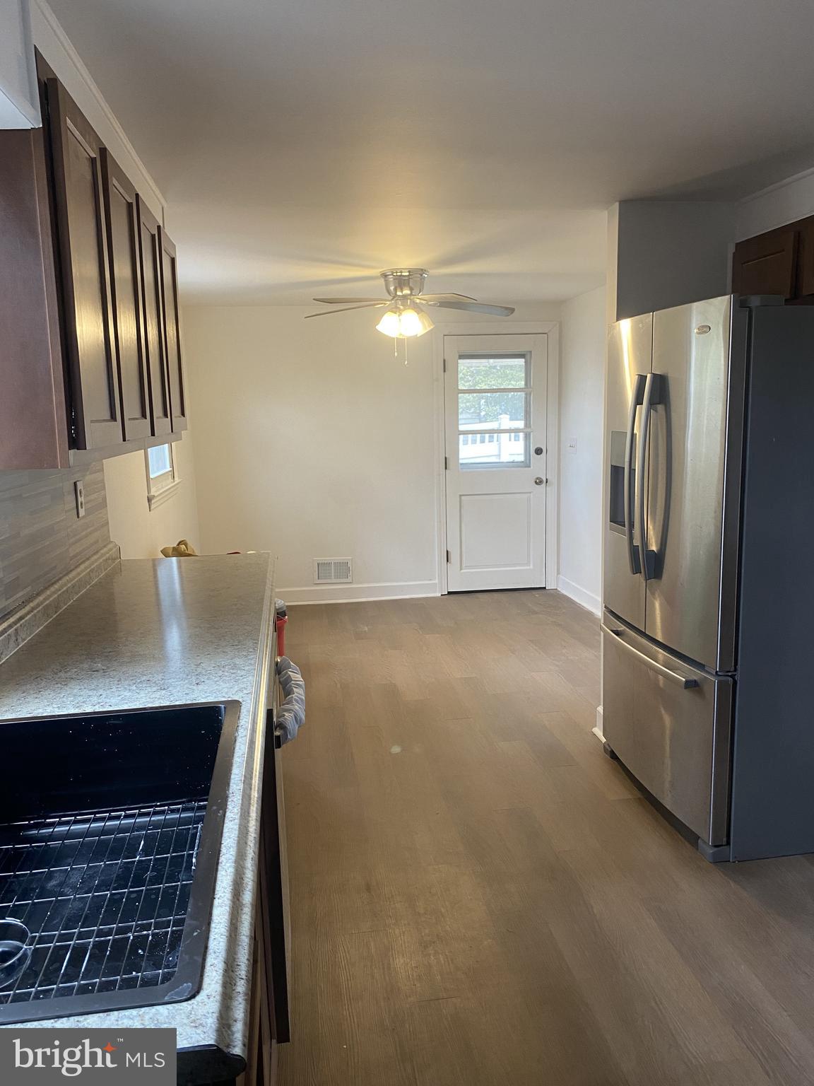 459 Scotch Road Titusville, NJ 08560 - Photo 3 of 16 a kitchen with stainless steel appliances a refrigerator and a sink