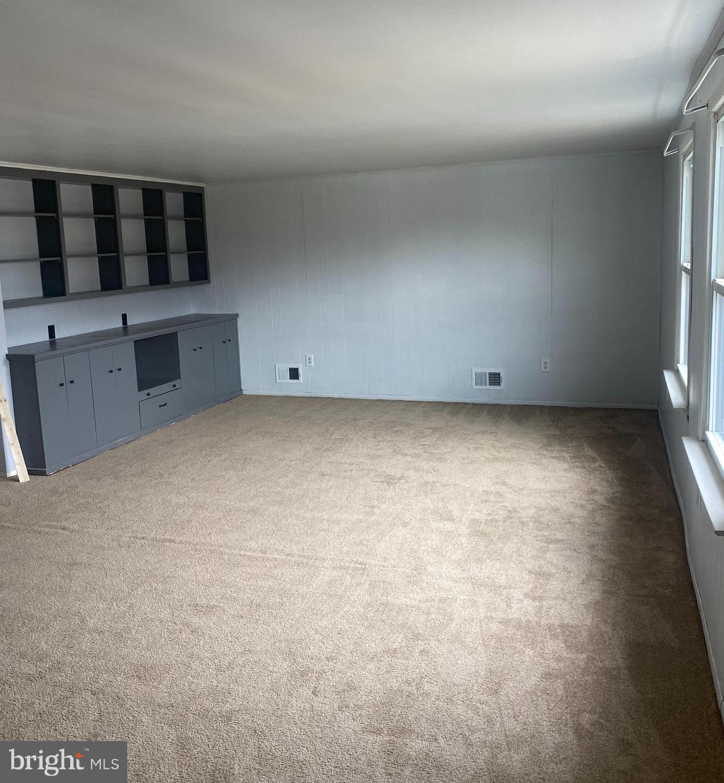 459 Scotch Road Titusville, NJ 08560 - Photo 5 of 16 a view of an empty room with a kitchen