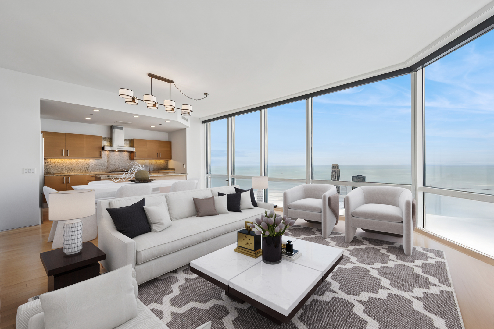 401 North Wabash Avenue, Unit 66G Chicago, IL 60611 - Photo 2 of 46 a living room with furniture and large windows