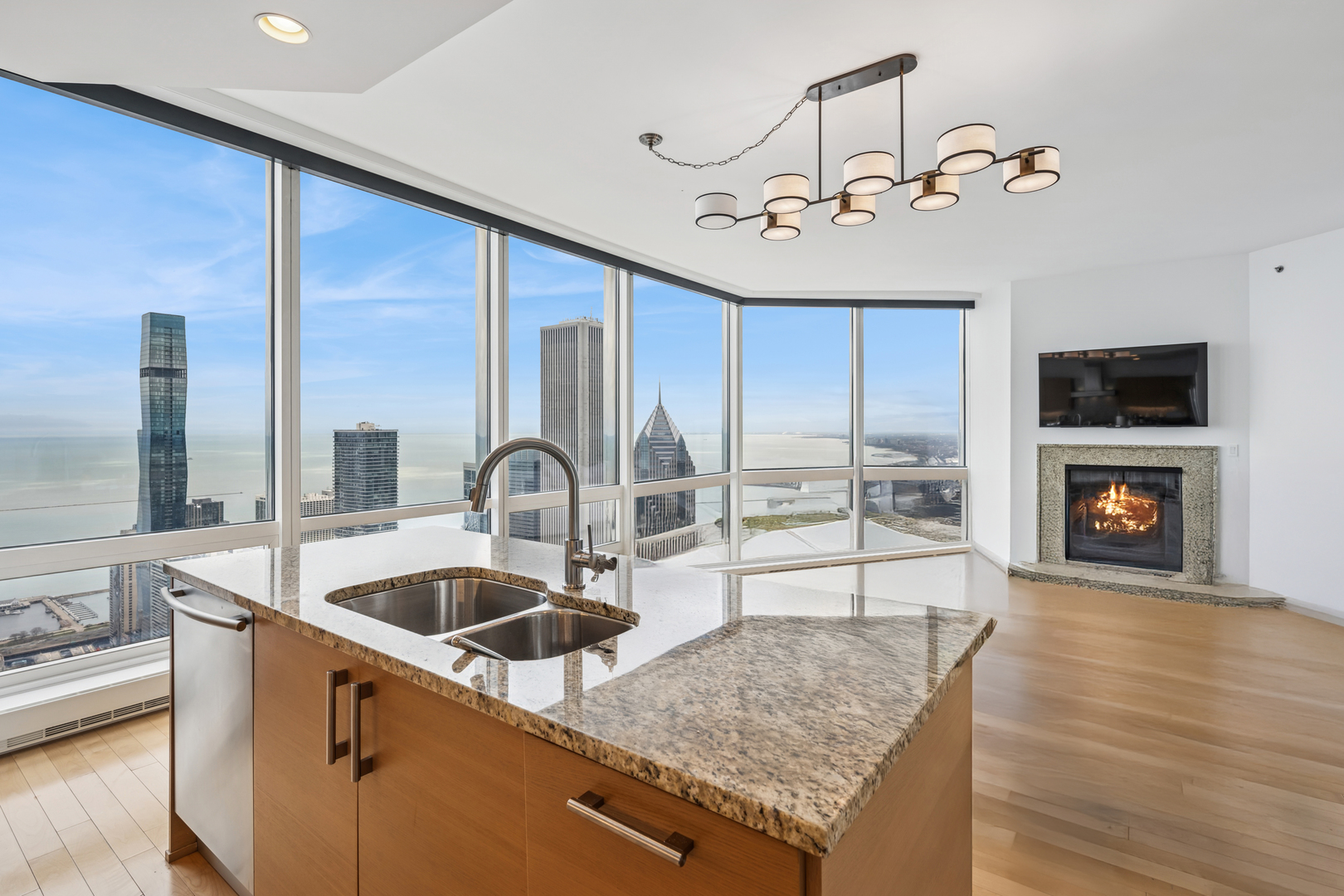 401 North Wabash Avenue, Unit 66G Chicago, IL 60611 - Photo 8 of 46 a kitchen with a sink a counter top space cabinets and stainless steel appliances