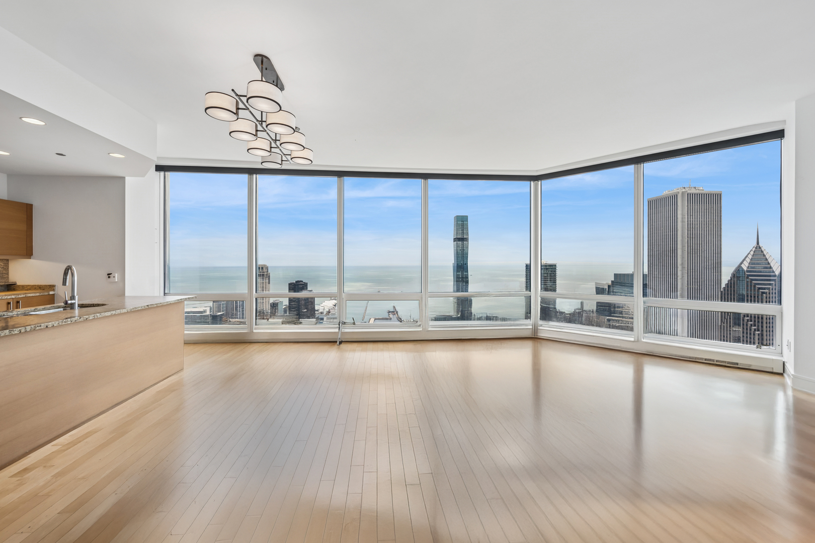 401 North Wabash Avenue, Unit 66G Chicago, IL 60611 - Photo 10 of 46 a view of a living room and a large window