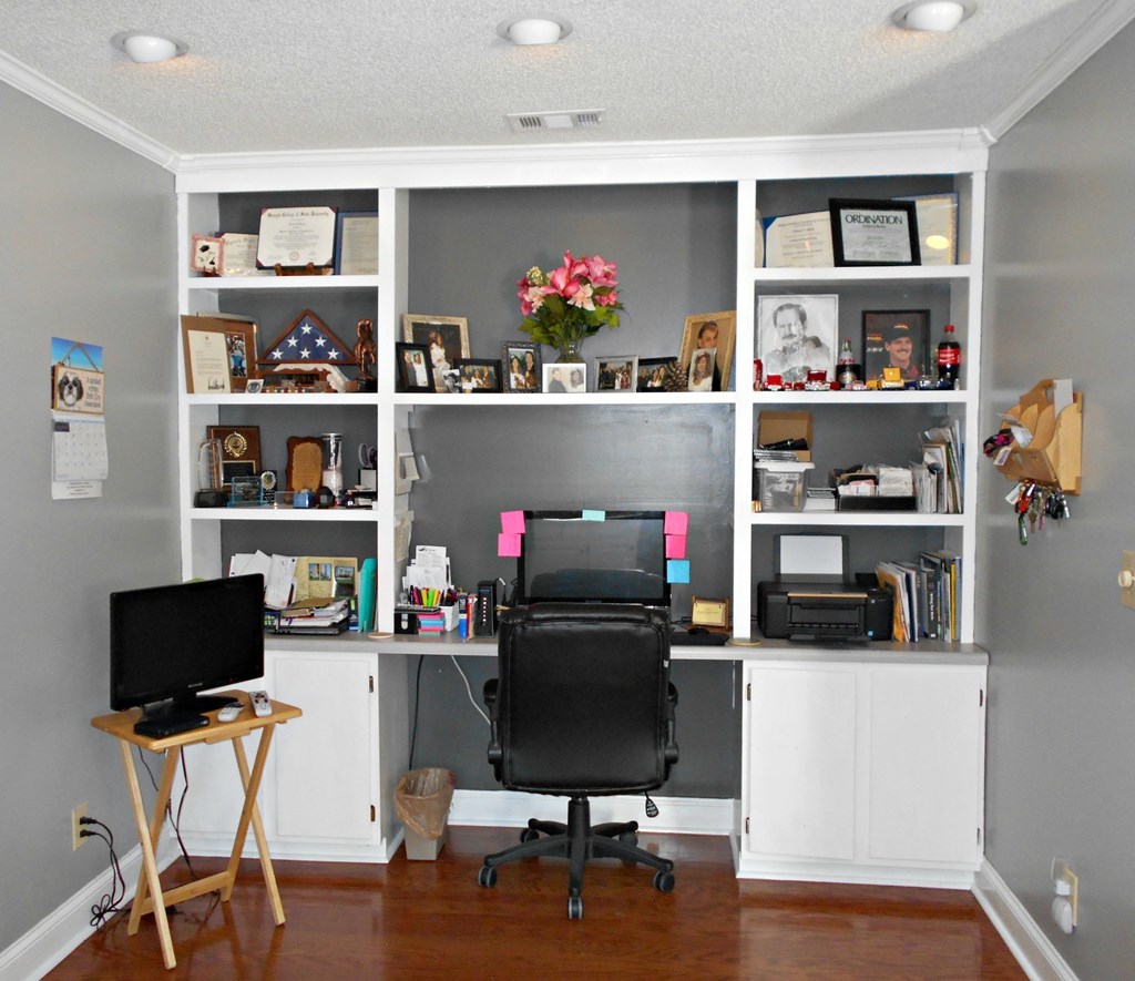 1135 Taylor Road Juliette, GA 31046 - Photo 6 of 12 a view of a workspace with furniture and a window