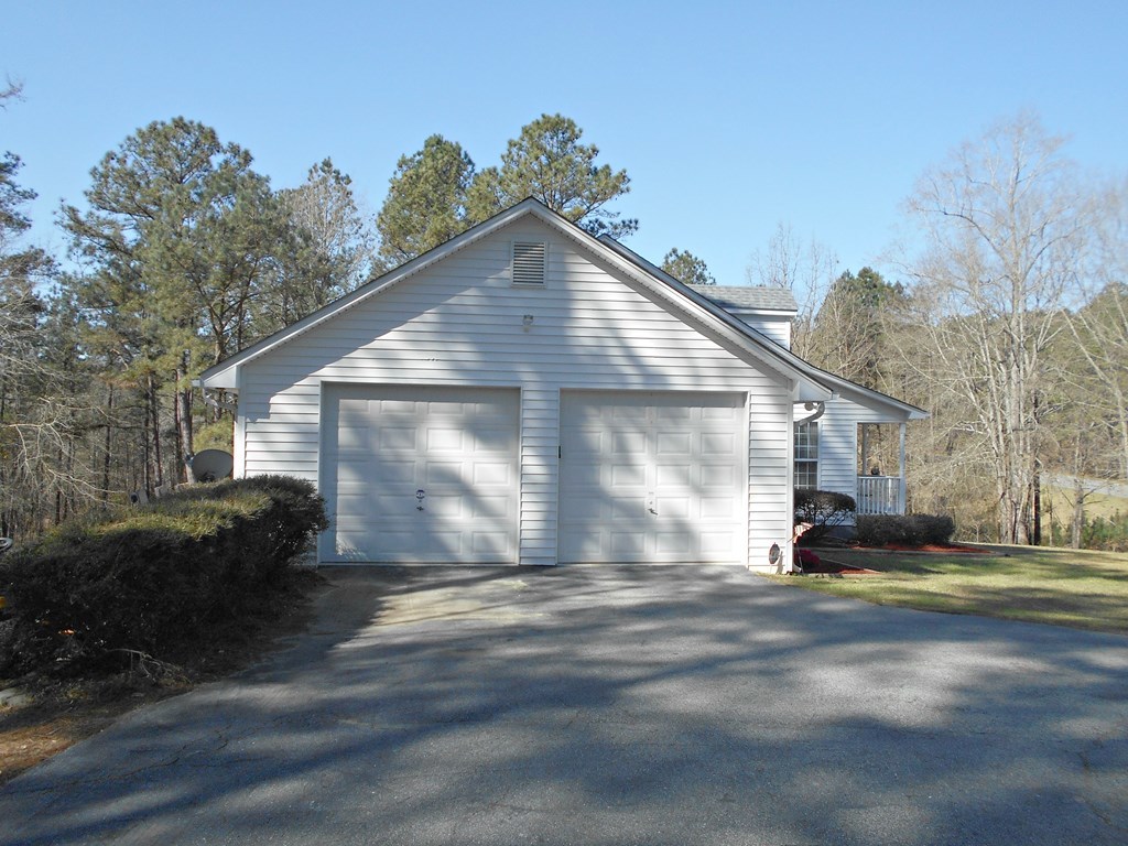 1135 Taylor Road Juliette, GA 31046 - Photo 10 of 12 a view of a house with a yard