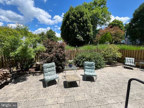 107 Carousel Circle Doylestown, PA 18901 - Photo 25 of 31 a view of a patio with chairs and a fire pit