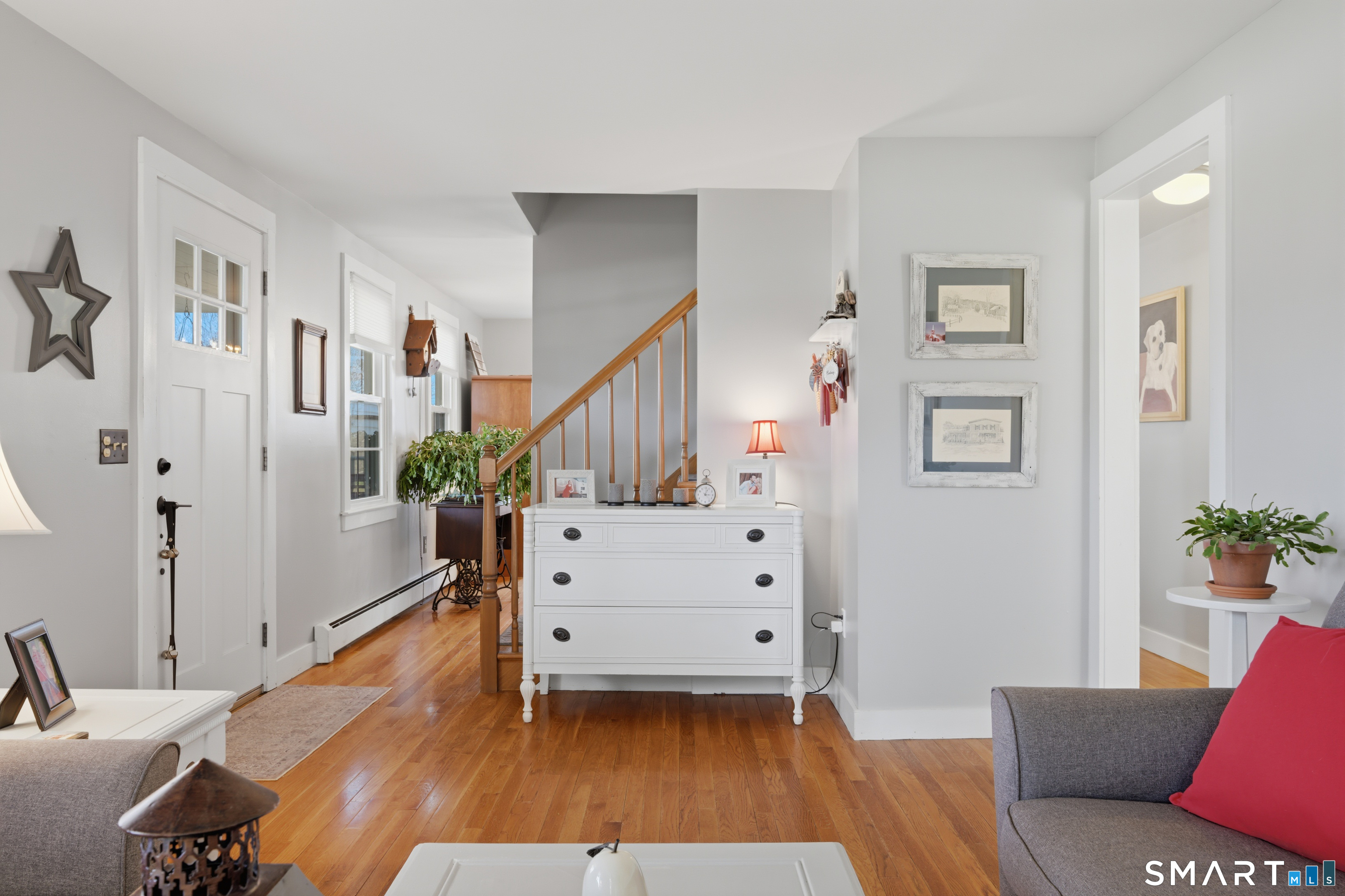 8 Windward Lane Ledyard, CT 06339 - Photo 14 of 37 Living Room Looking At Front Door & Stairs