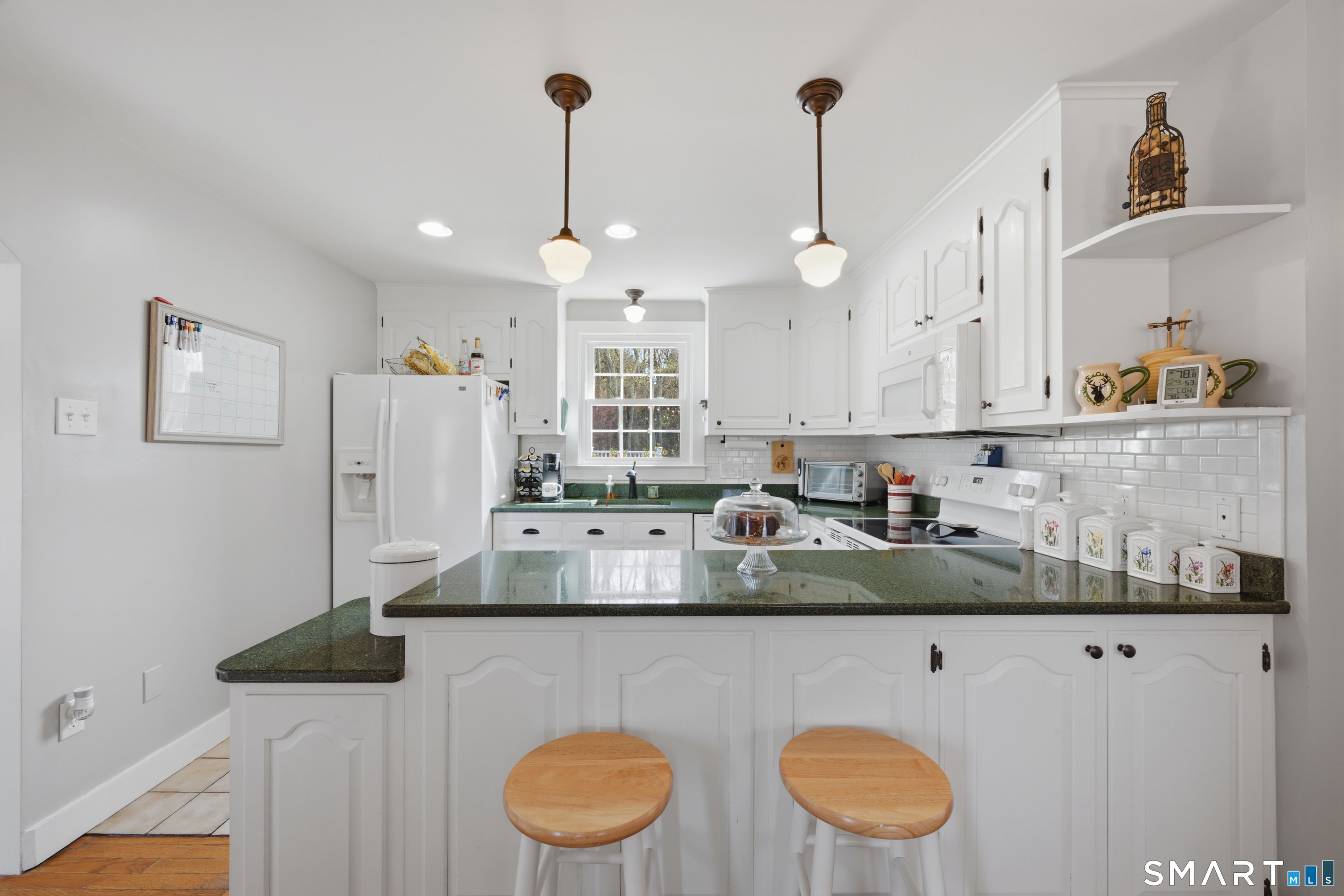 8 Windward Lane Ledyard, CT 06339 - Photo 21 of 37 Updated Kitchen With Counter Seating