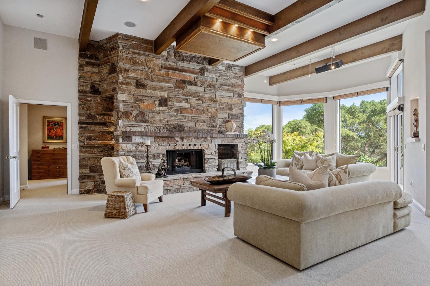 25 Preston Road Woodside, CA 94062 - Photo 23 of 71 a living room with furniture and a fireplace