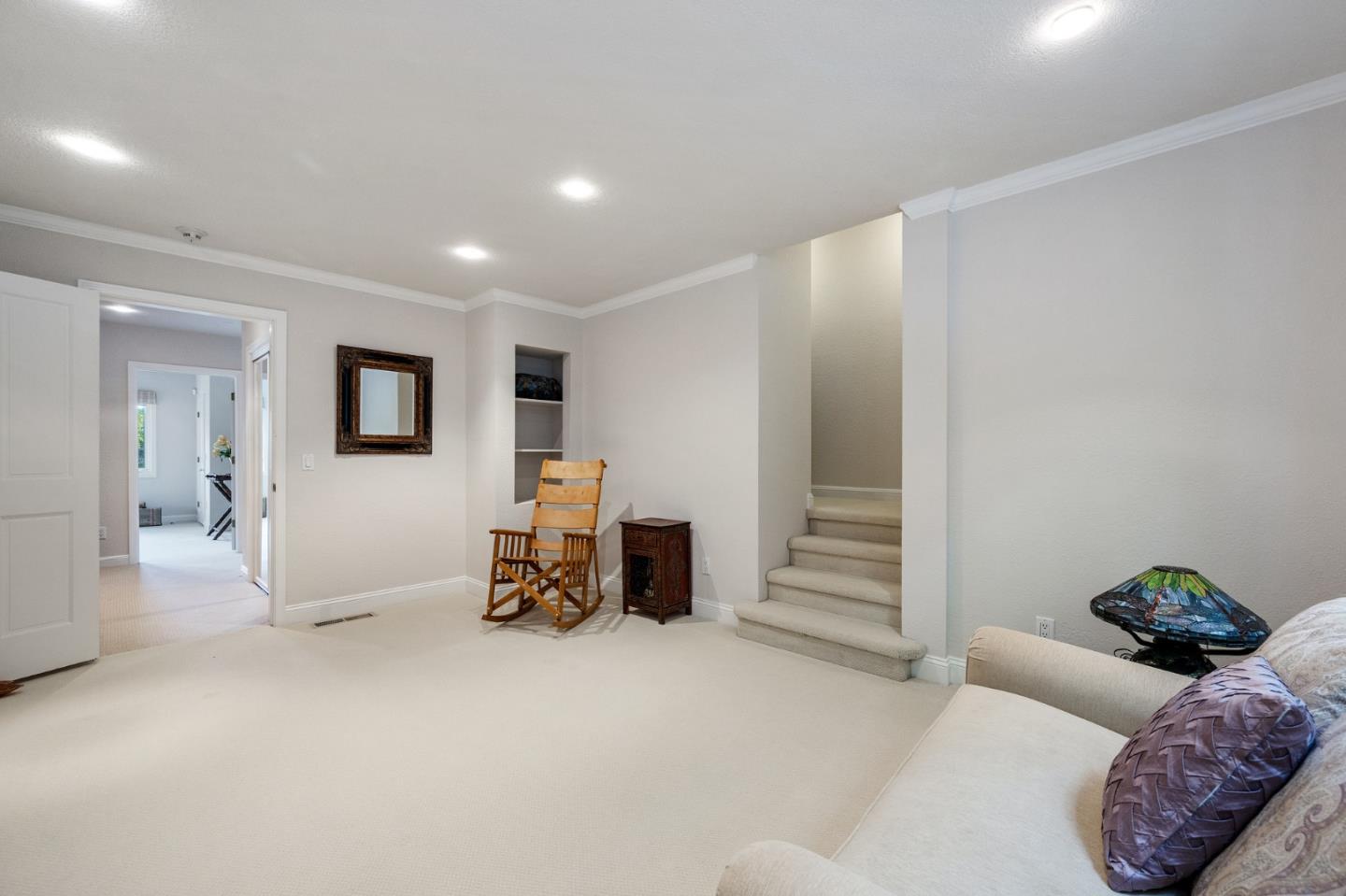 25 Preston Road Woodside, CA 94062 - Photo 36 of 71 a living room with furniture and a flat screen tv