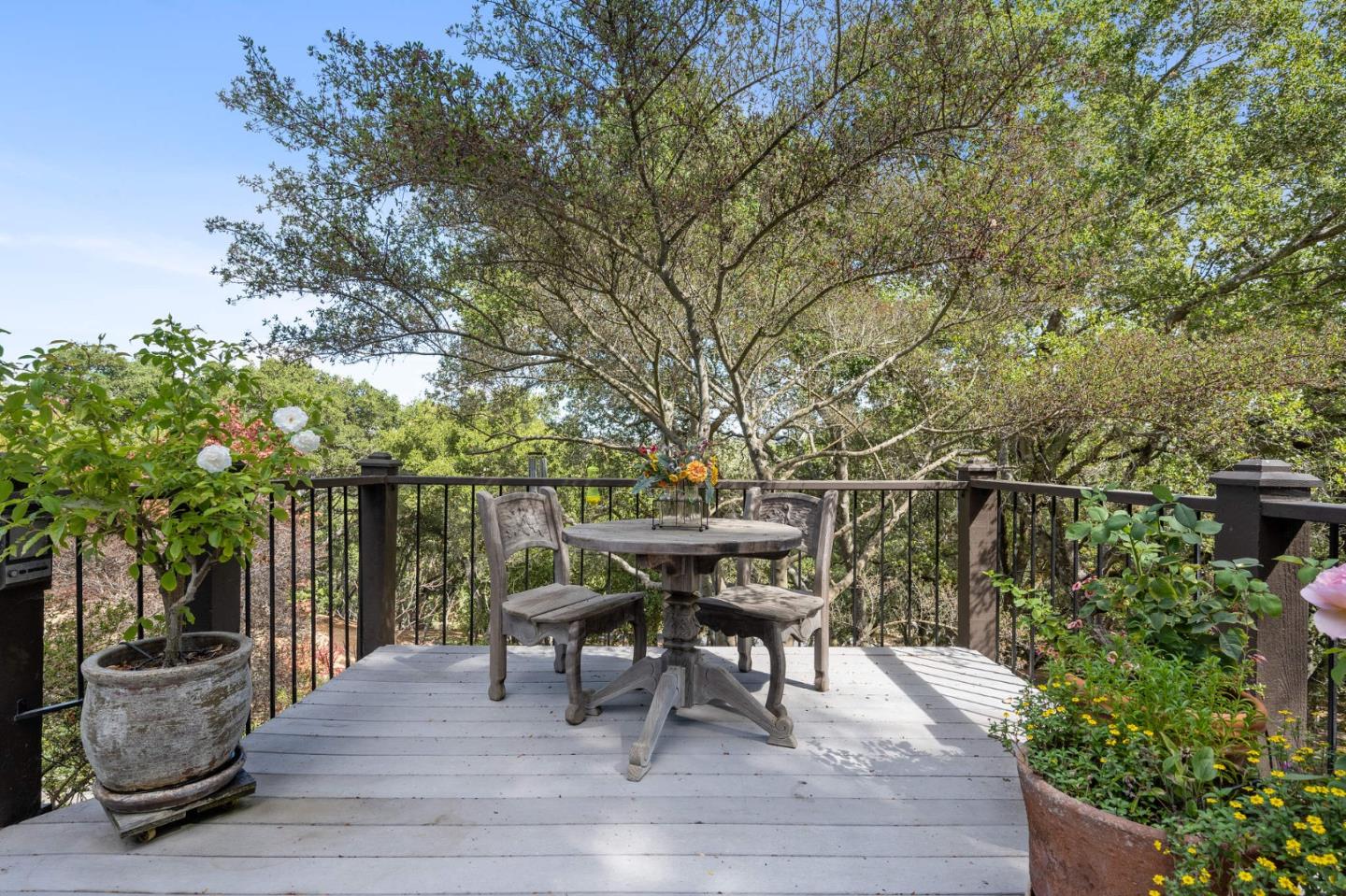 25 Preston Road Woodside, CA 94062 - Photo 43 of 71 a view of a chairs and table on the wooden floor