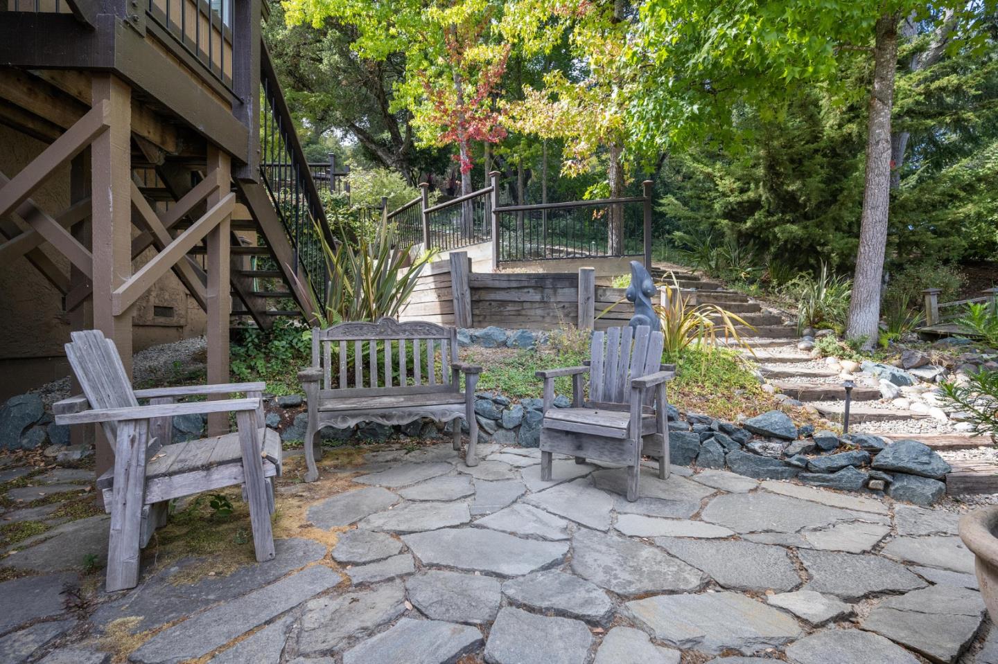 25 Preston Road Woodside, CA 94062 - Photo 46 of 71 a view of a chair and table in backyard