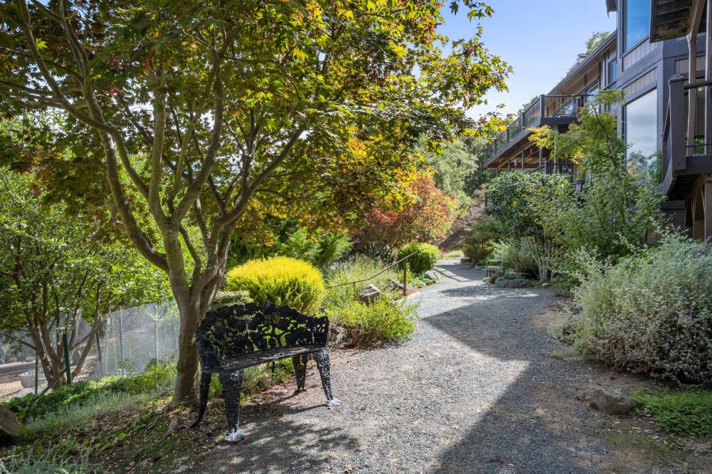 25 Preston Road Woodside, CA 94062 - Photo 49 of 71 a view of a chair and table in the garden