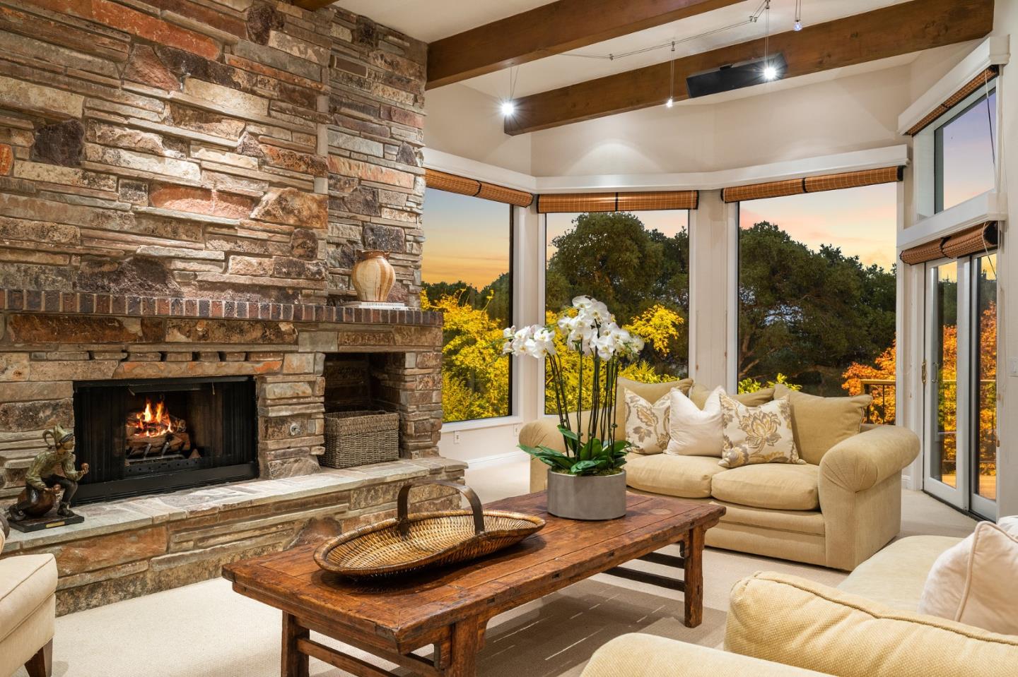 25 Preston Road Woodside, CA 94062 - Photo 61 of 71 a living room with furniture a fireplace and a large window