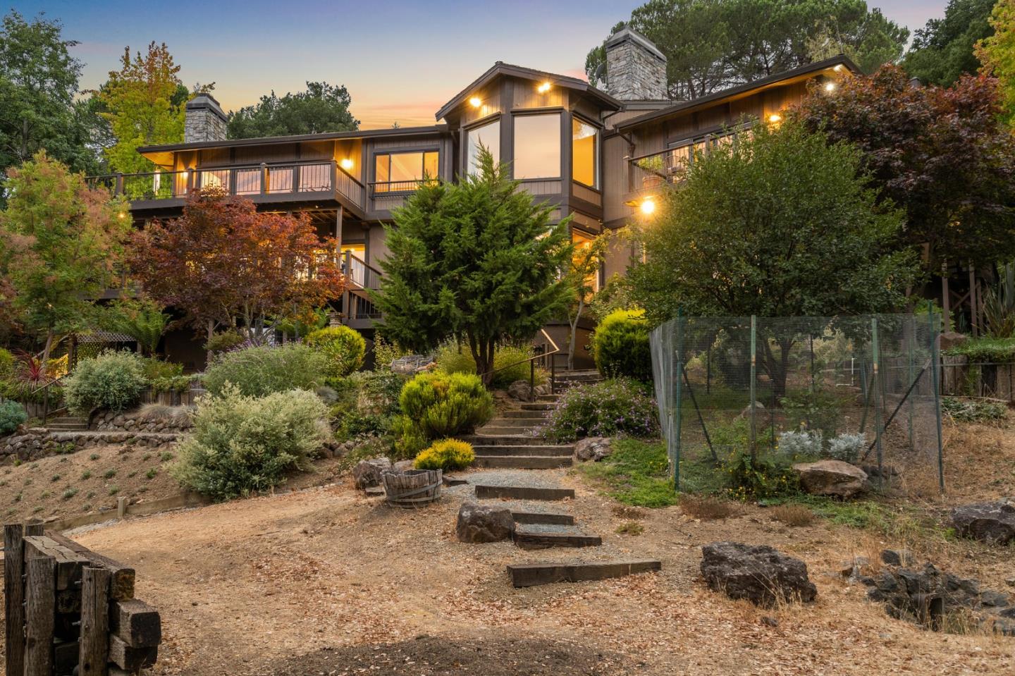 25 Preston Road Woodside, CA 94062 - Photo 64 of 71 a view of a brick house with a yard and plants