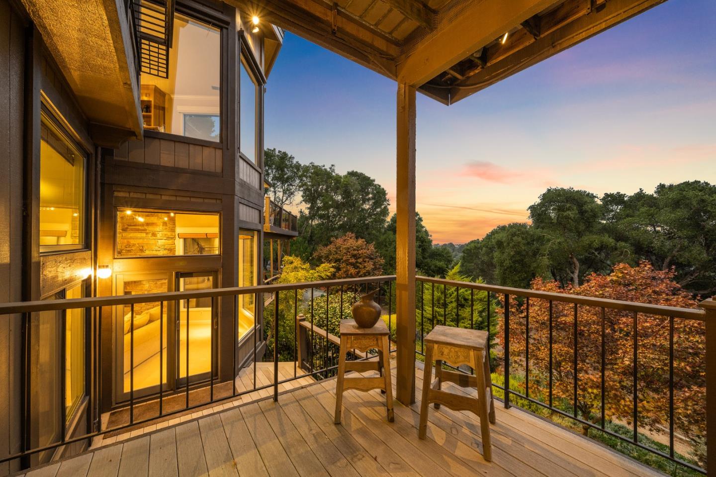 25 Preston Road Woodside, CA 94062 - Photo 66 of 71 a view of a balcony with chairs and wooden floor