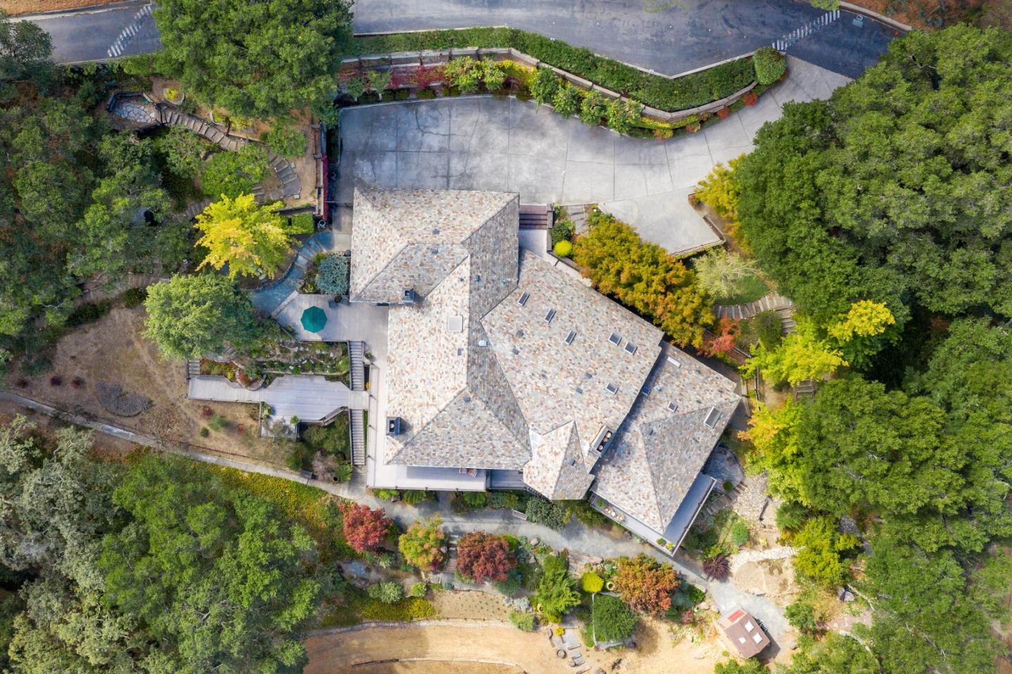 25 Preston Road Woodside, CA 94062 - Photo 71 of 71 an aerial view of a house with a yard and a large pool