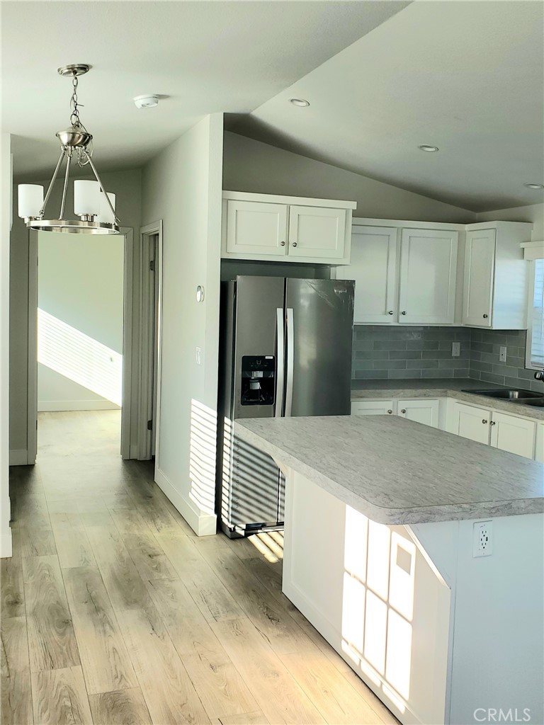 8100 Foothill Boulevard, Unit 1 Sunland, CA 91040 - Photo 5 of 11 a kitchen with stainless steel appliances granite countertop a refrigerator a sink and a stove