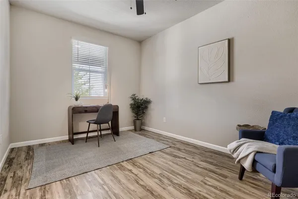 a workspace with furniture and window