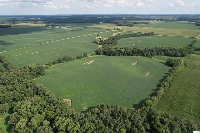 a view of a lake with a yard