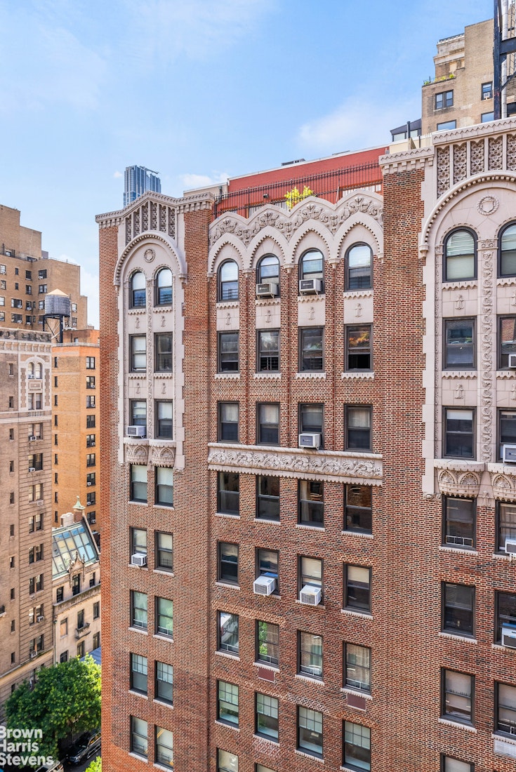 11 Riverside Drive, Unit 15OE Manhattan, NY 10023 - Photo 11 of 12 a front view of a building with glass windows
