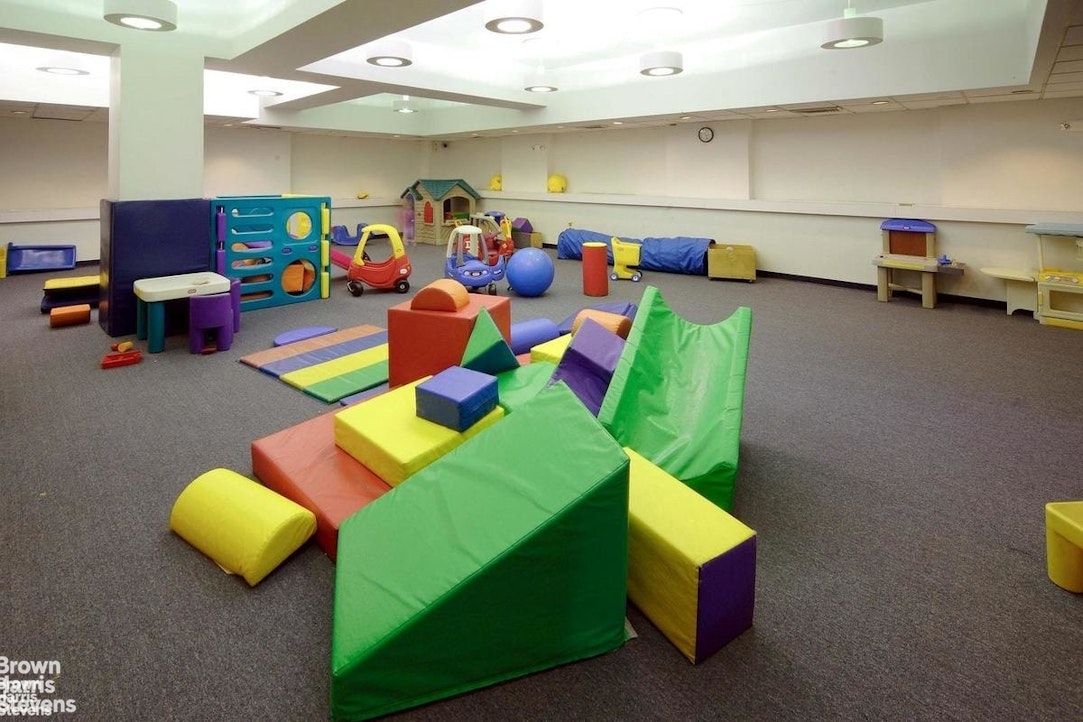 11 Riverside Drive, Unit 15OE Manhattan, NY 10023 - Photo 7 of 12 a play room with furniture