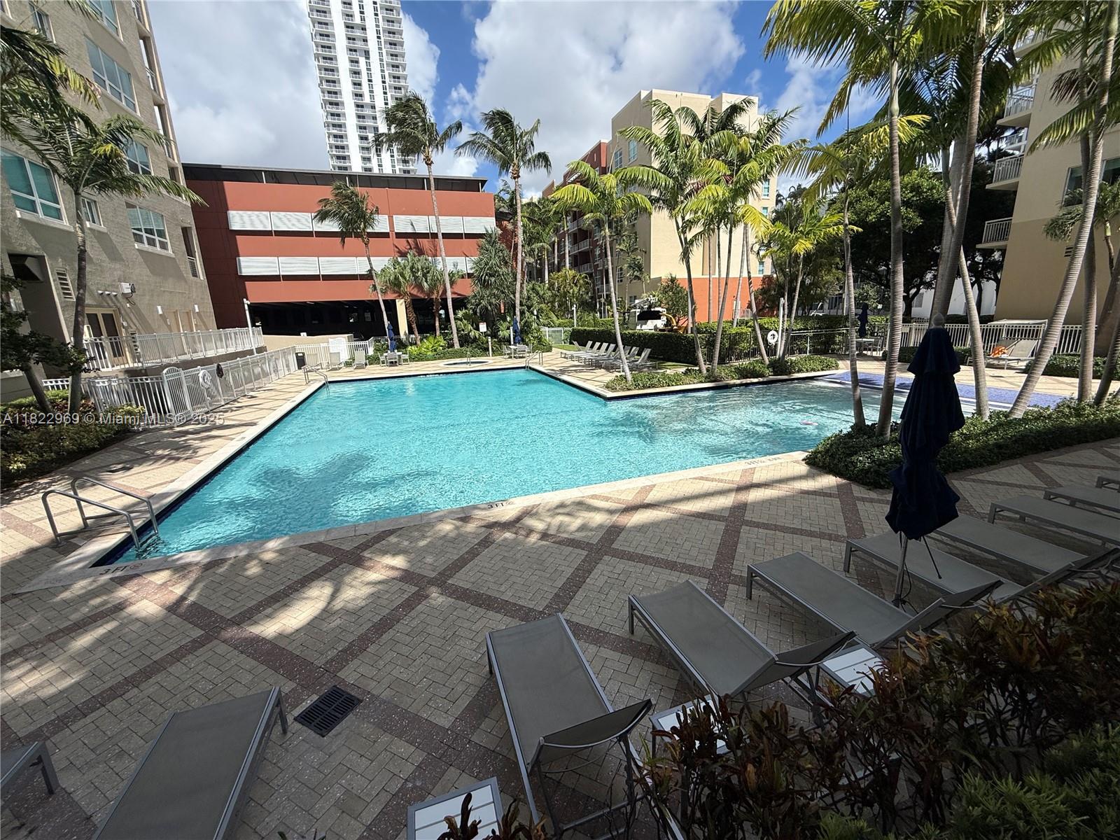 2001 Biscayne Boulevard, Unit 2402 Miami, FL 33137 - Photo 51 of 64 a view of a backyard with sitting area