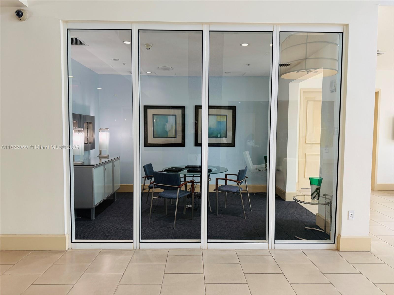 2001 Biscayne Boulevard, Unit 2402 Miami, FL 33137 - Photo 55 of 64 a bathroom with a glass shower door