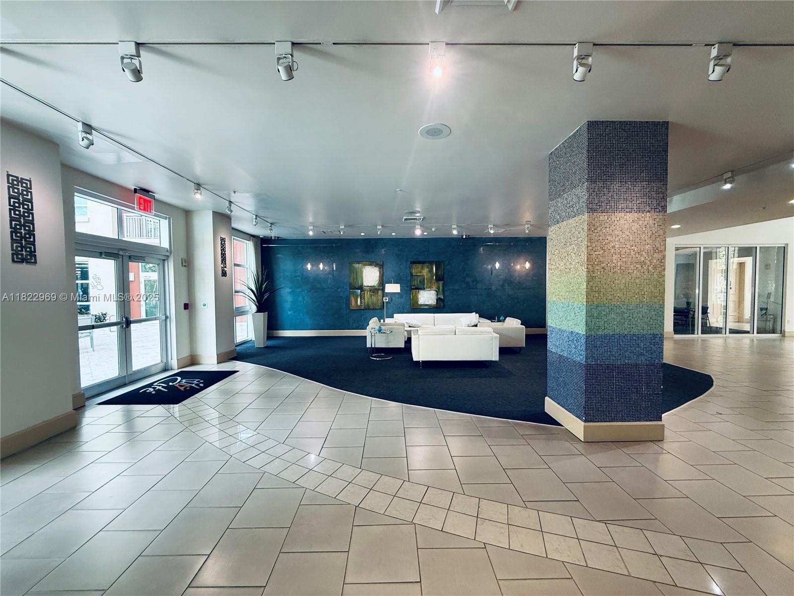 2001 Biscayne Boulevard, Unit 2402 Miami, FL 33137 - Photo 57 of 64 a lobby with furniture and window