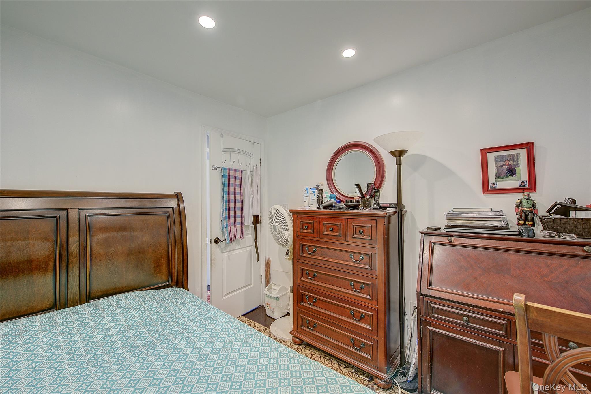 89-06 175th Street Queens, NY 11432 - Photo 14 of 29 Bedroom featuring recessed lighting