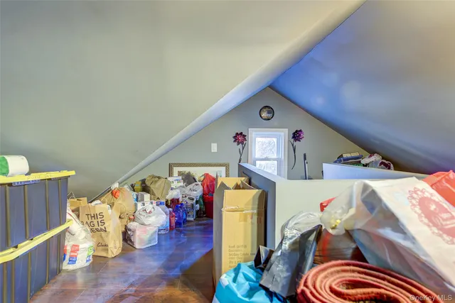a storage room with furniture and rug