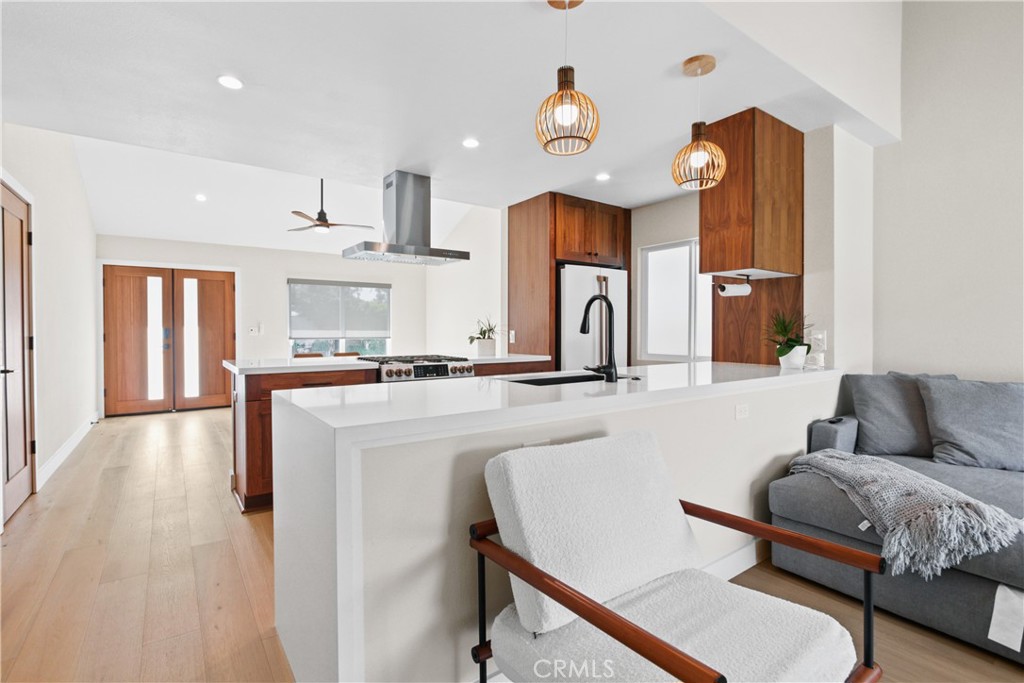 34561 Calle Monte Dana Point, CA 92624 - Photo 7 of 22 a living room with kitchen island furniture and a window