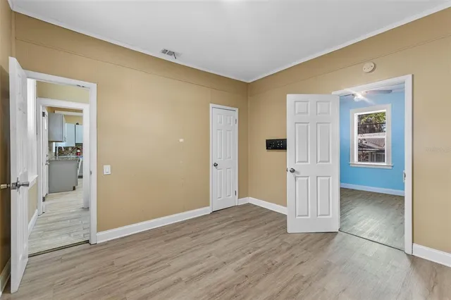 a kitchen with stainless steel appliances granite countertop a refrigerator and a stove