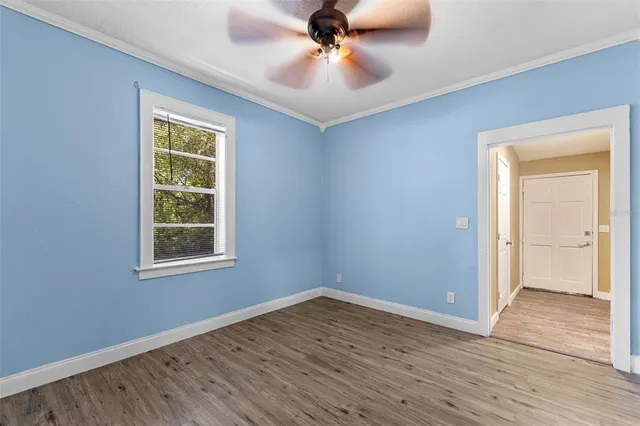 a kitchen with a refrigerator stove top oven and sink
