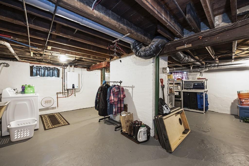 26 Elsworth Road Newton, MA 02465 - Photo 14 of 18 a view of a storage room with racks