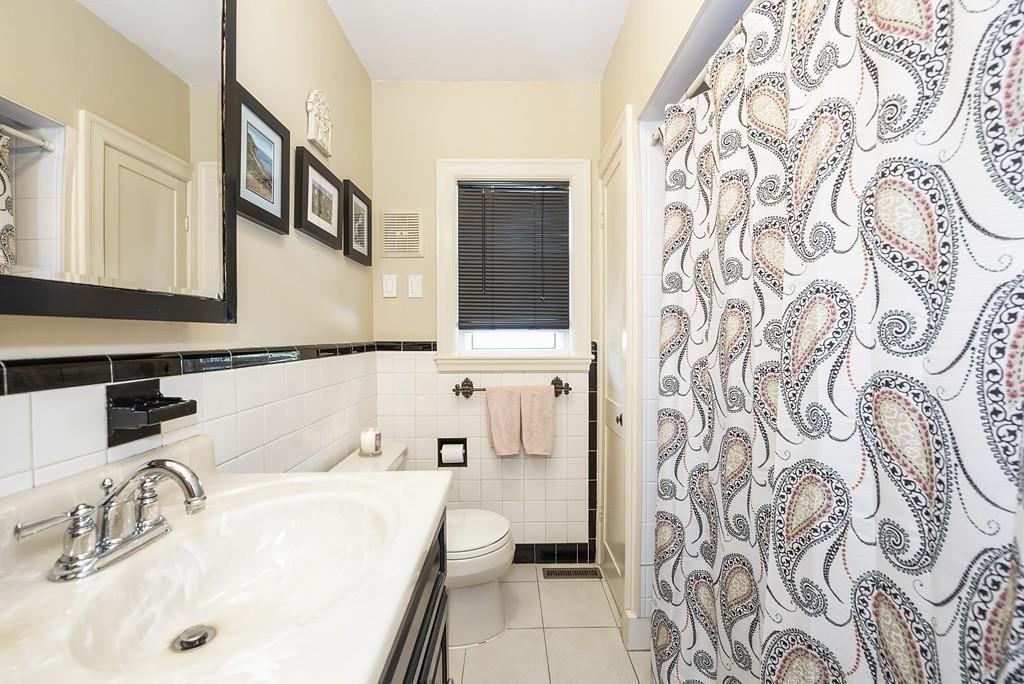 26 Elsworth Road Newton, MA 02465 - Photo 8 of 18 a bathroom with a sink and a bathtub