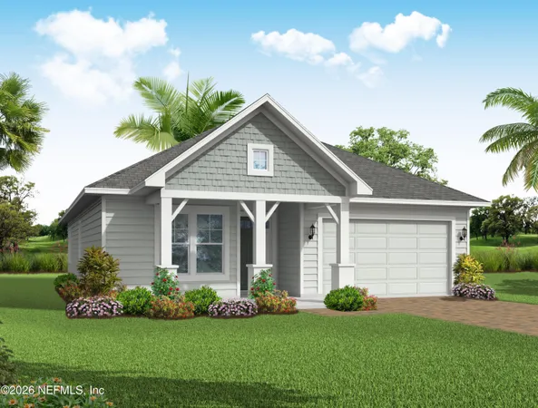 a front view of a house with a garden and plants