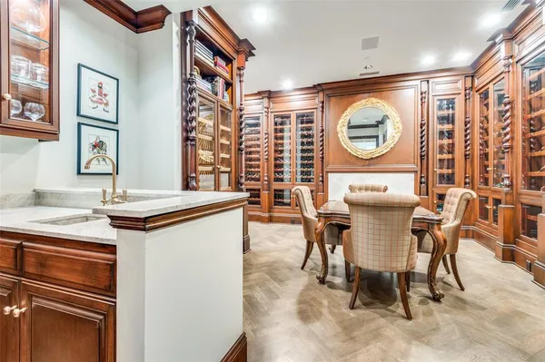 a kitchen with a cabinets and chairs