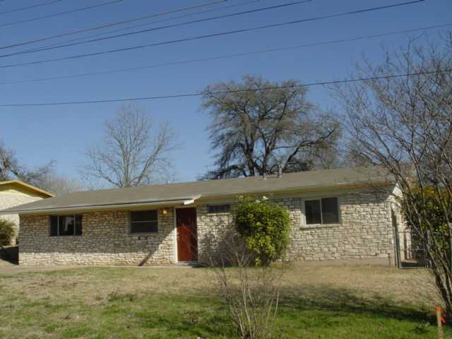 1801 Rhodes Road Austin, TX 78721 - Photo 1 of 1 a view of a house with a yard