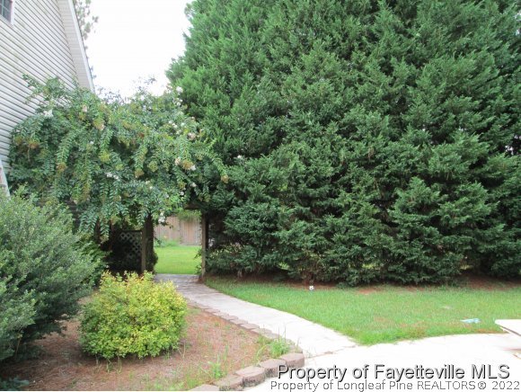 702 Wildwood Road Aberdeen, NC 28315 - Photo 18 of 19 a view of a yard