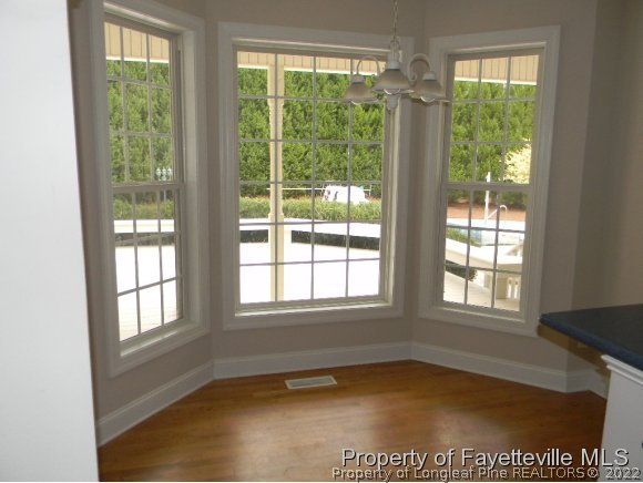 702 Wildwood Road Aberdeen, NC 28315 - Photo 6 of 19 a view of an empty room with a window