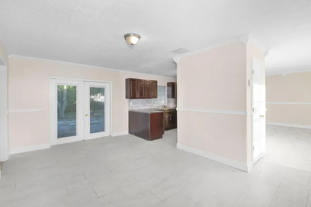 a view of a kitchen with a sink
