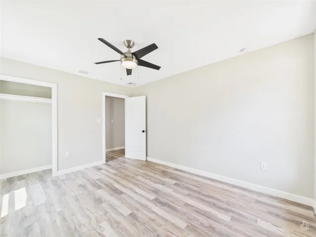 a view of a big room with wooden floor