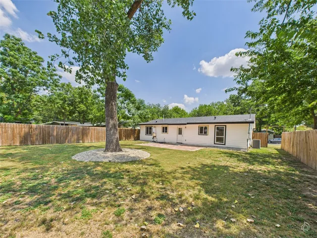 a house view with a garden space