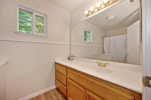 a living room with flat screen tv