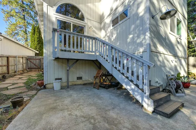 a view of a chairs and table in the patio