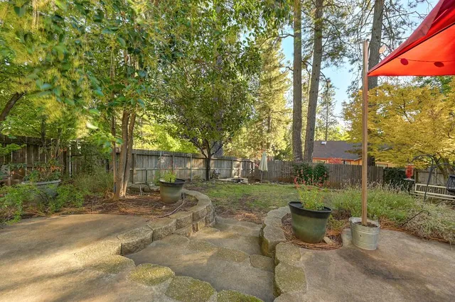 a backyard of a house with lots of green space